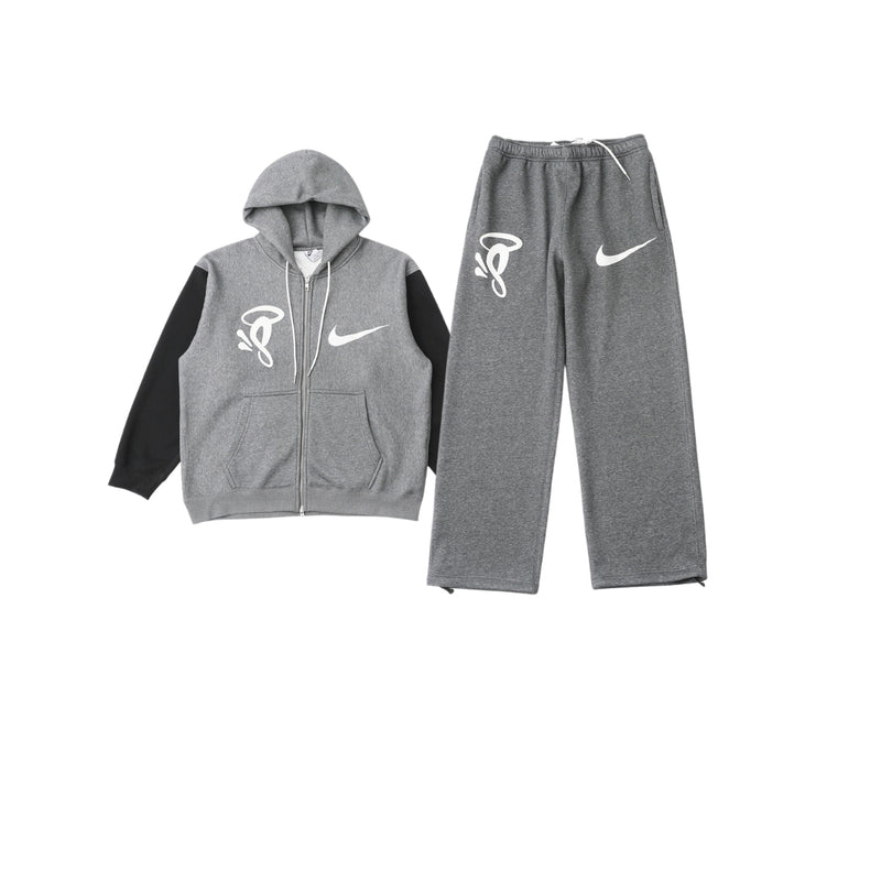 NOCTA Tuta Nike x Syna Solo Swoosh in pile grigio