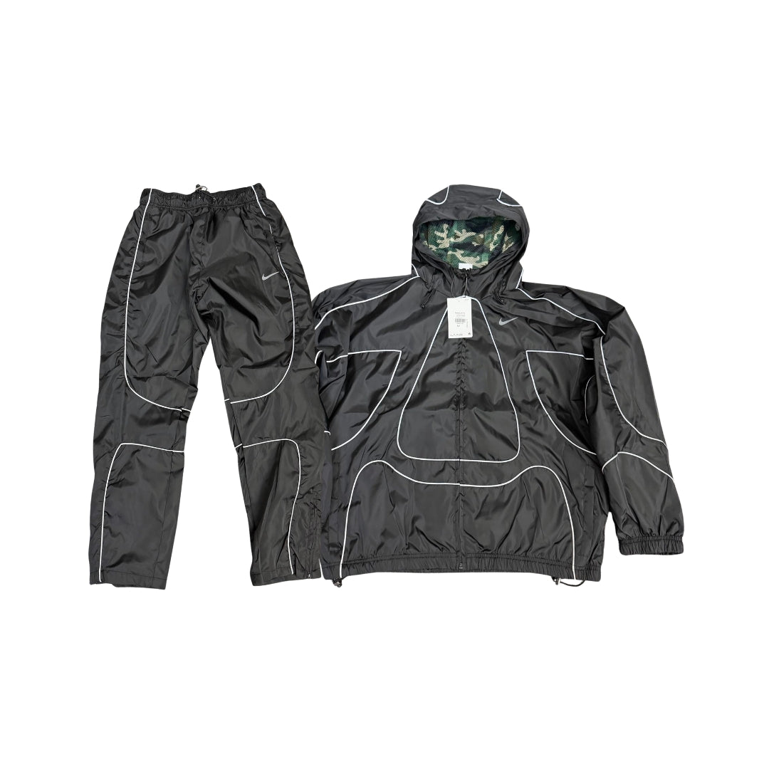 NOCTA Tuta Nike x Corteiz riflettente nera