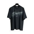 Balenciaga T-shirt Nera Con Logo Cursivo