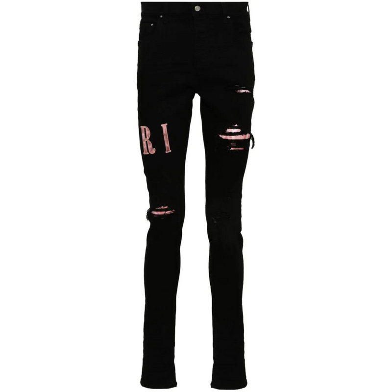 AMIRI waxed logo-appliqué skinny jeans
