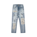 AMIRI Ripped Letters Skinny Jeans