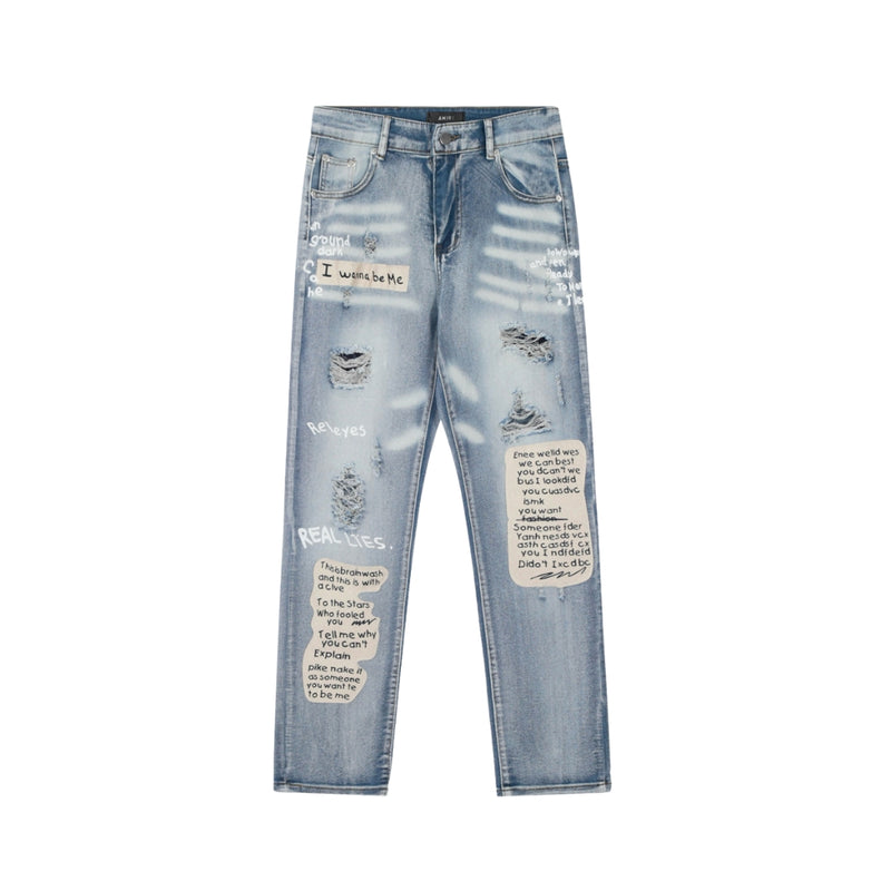 AMIRI Ripped Letters Skinny Jeans