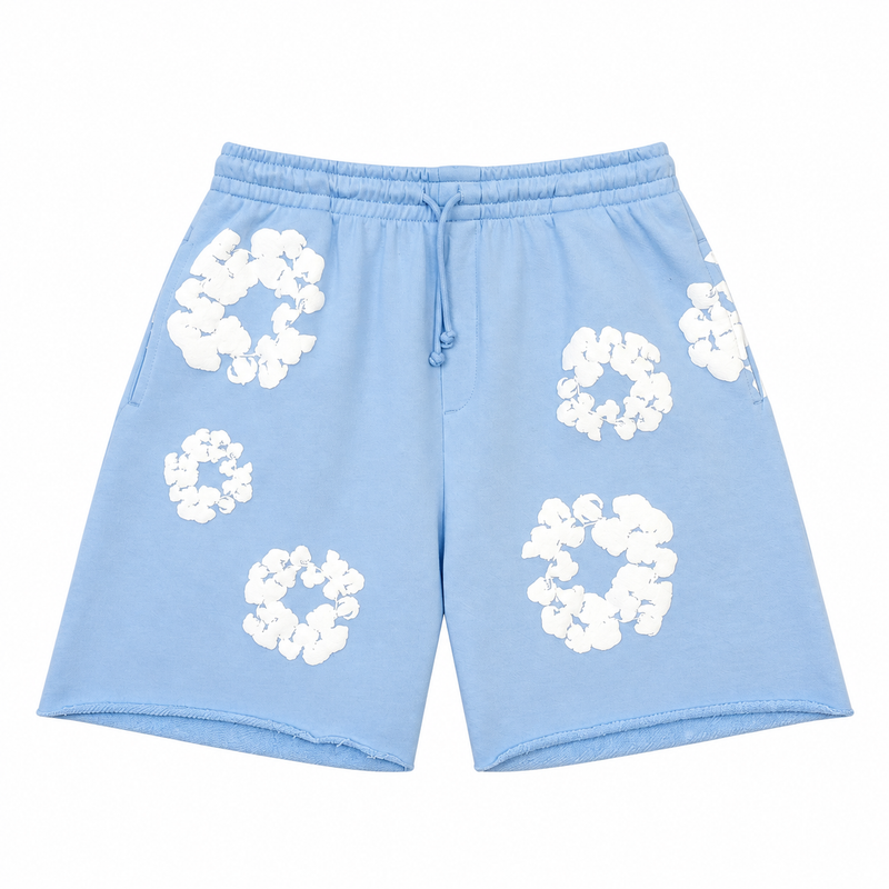Denim Tears Pantaloncini da tuta The Cotton Wreath “Azzurro Cipria”