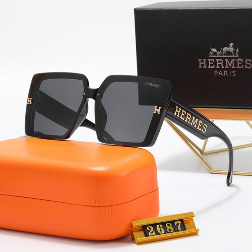 Black square sunglasses with gold-tone details